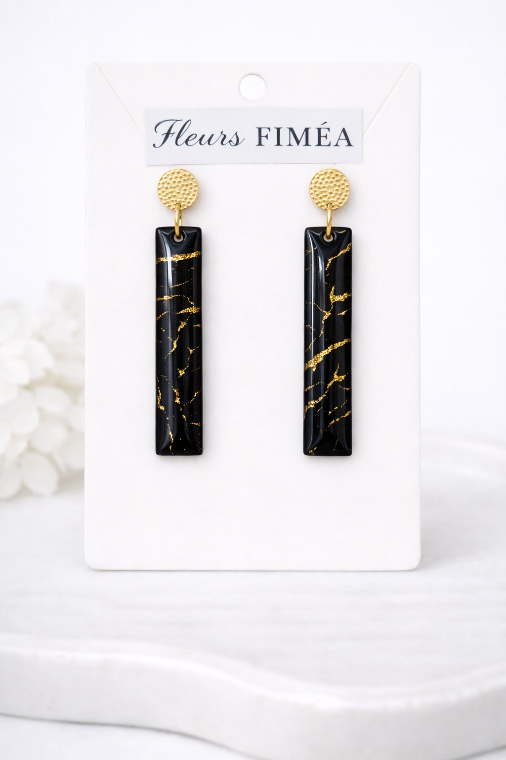 Boucles d’oreilles pendantes dorées femme NOIR ÉCLAT – Noir marbré et éclats dorés.