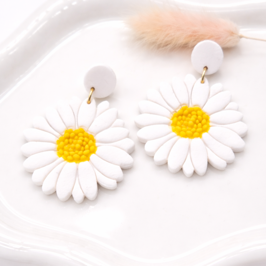 Boucles d’oreilles marguerite – bijou femme en acier inoxydable